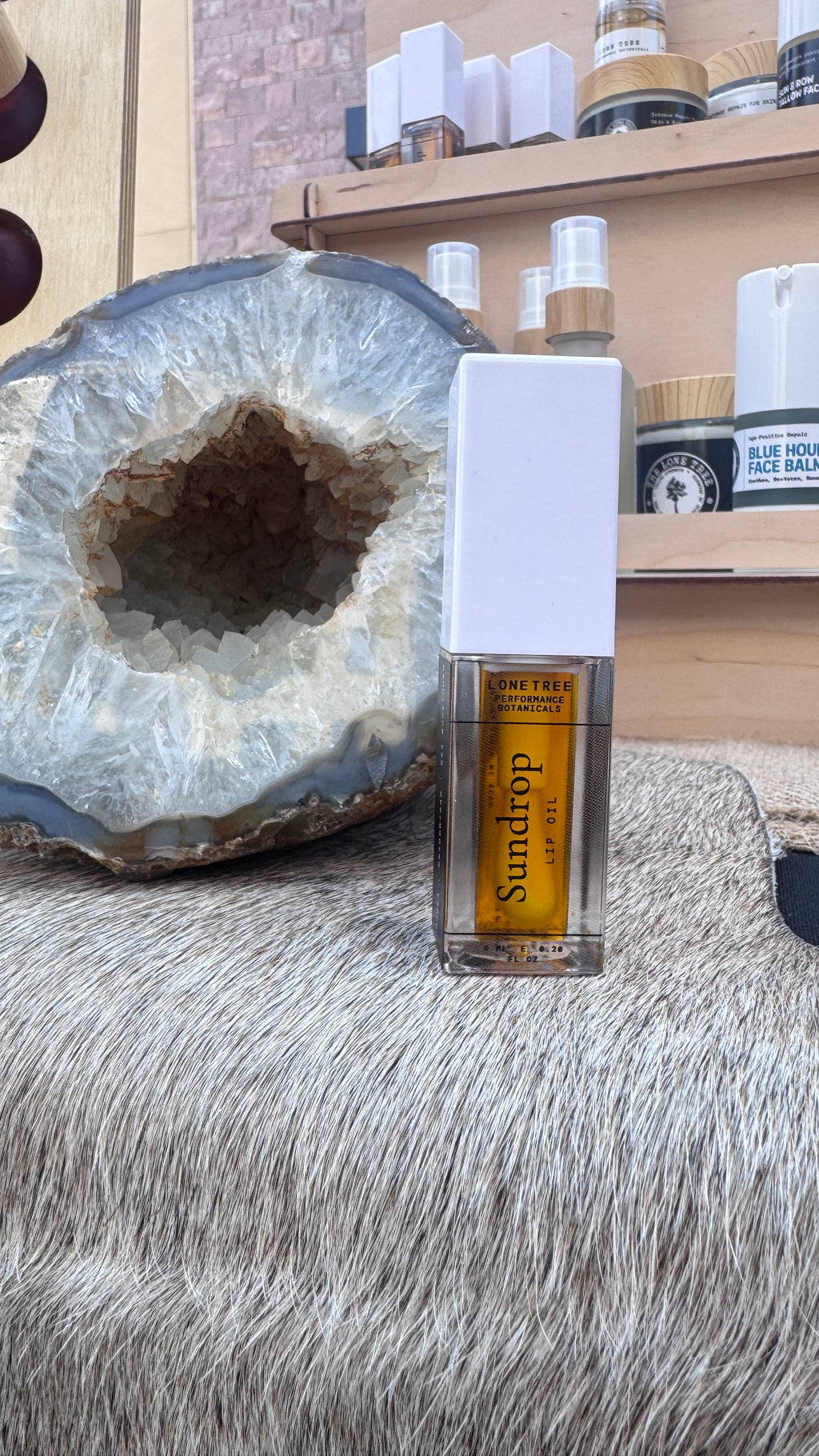 Sundrop lip oil by lone tree tallow co. Squalane, meadowfoam, jojoba, honey flavor, sea buckthorn berry oil, vitamin e