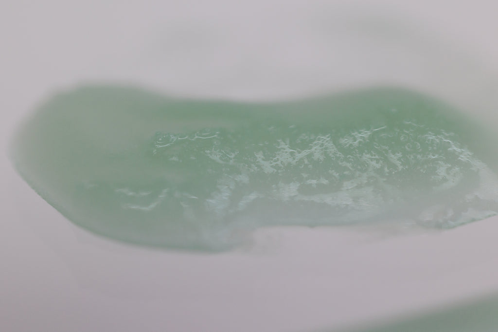 Blue Hour Tallow Face Balm texture close-up. Heritage grass-fed tallow is paired with luxury performance oils and bioactives such as  bakuchiol and blue tansy - handcrafted by a chemist on the Prairie of South Dakota. 