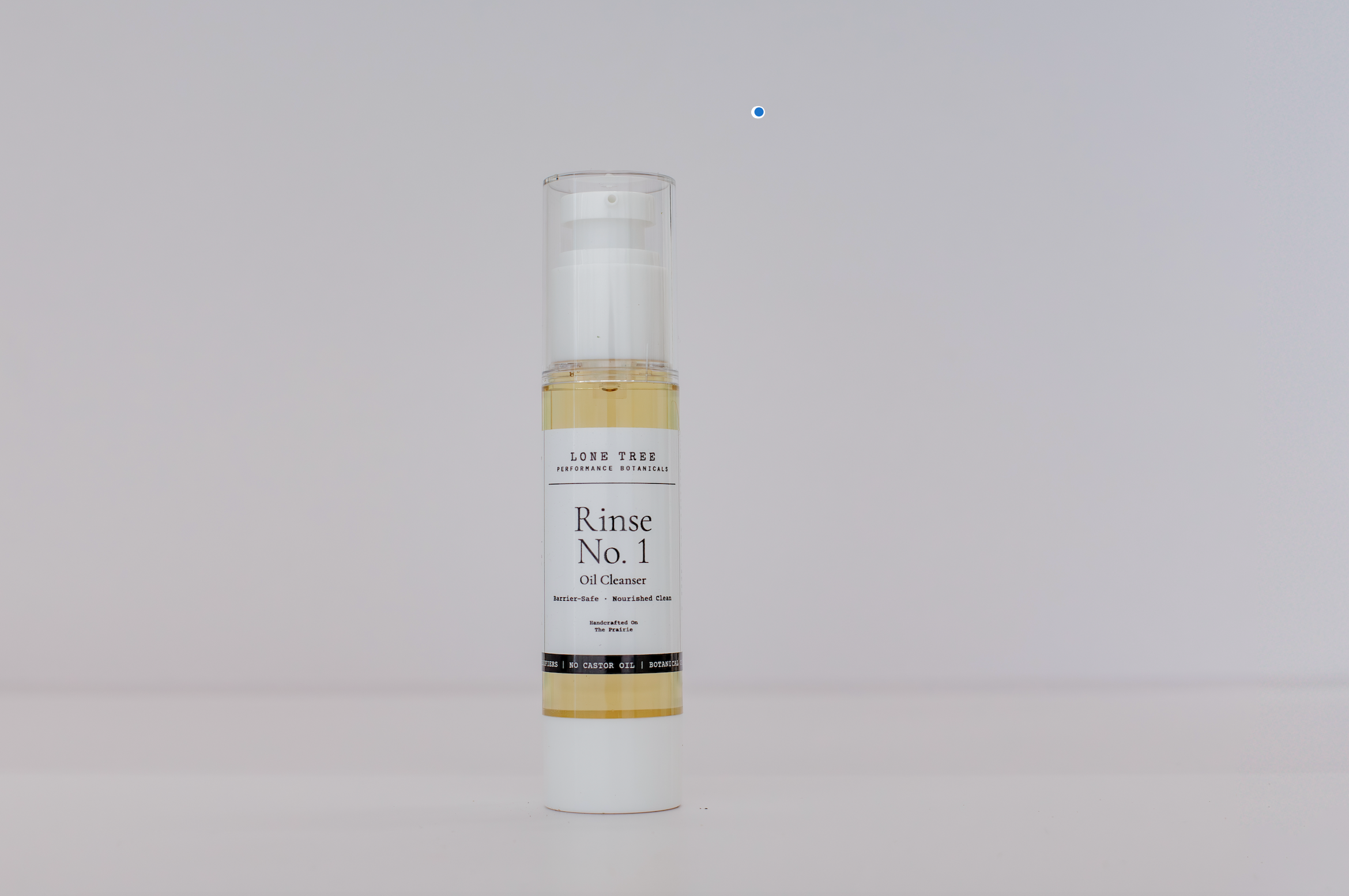 Lone Tree Performance Botanicals Rinse No. 1 Oil Cleanser does not strip your skin's natural barrier and is great for perimenopausal, menopausal, or hormonal skin.  This picture shows a 2oz container. No castor oil, emulsifers, or fragrances. Just luxury oils that melt away makeup and dirt, leaving skin feeling soft and clean.