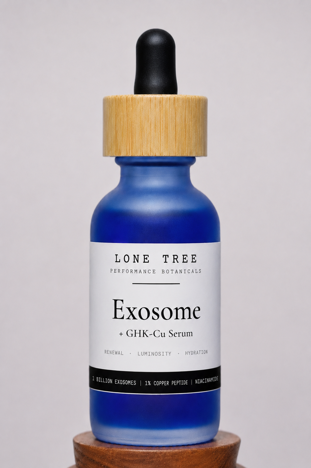 Exosome plus GHK-Cu Serum by Lone Tree Performance Botanicals, cobalt glass dropper bottle